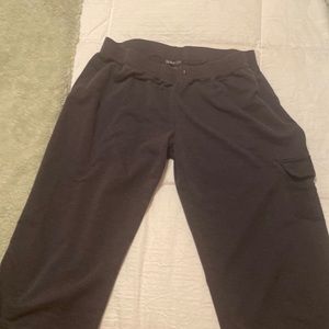 Womens capri sweat pants. Black. Has little ties at end of leg and side pocket.